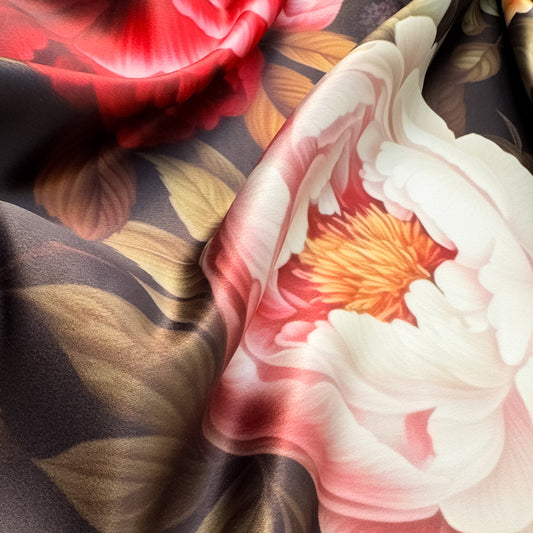 Berrylicious – floral print on luxurious duchesse satin with large vibrant blossoms and mixed berries on a dark background, glossy surface and sculptural folds, design by Sewing Club.